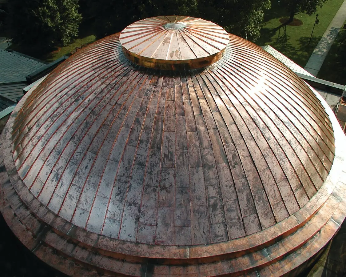 Craftsman Roofing crew installing a new roof in Patio Homes East